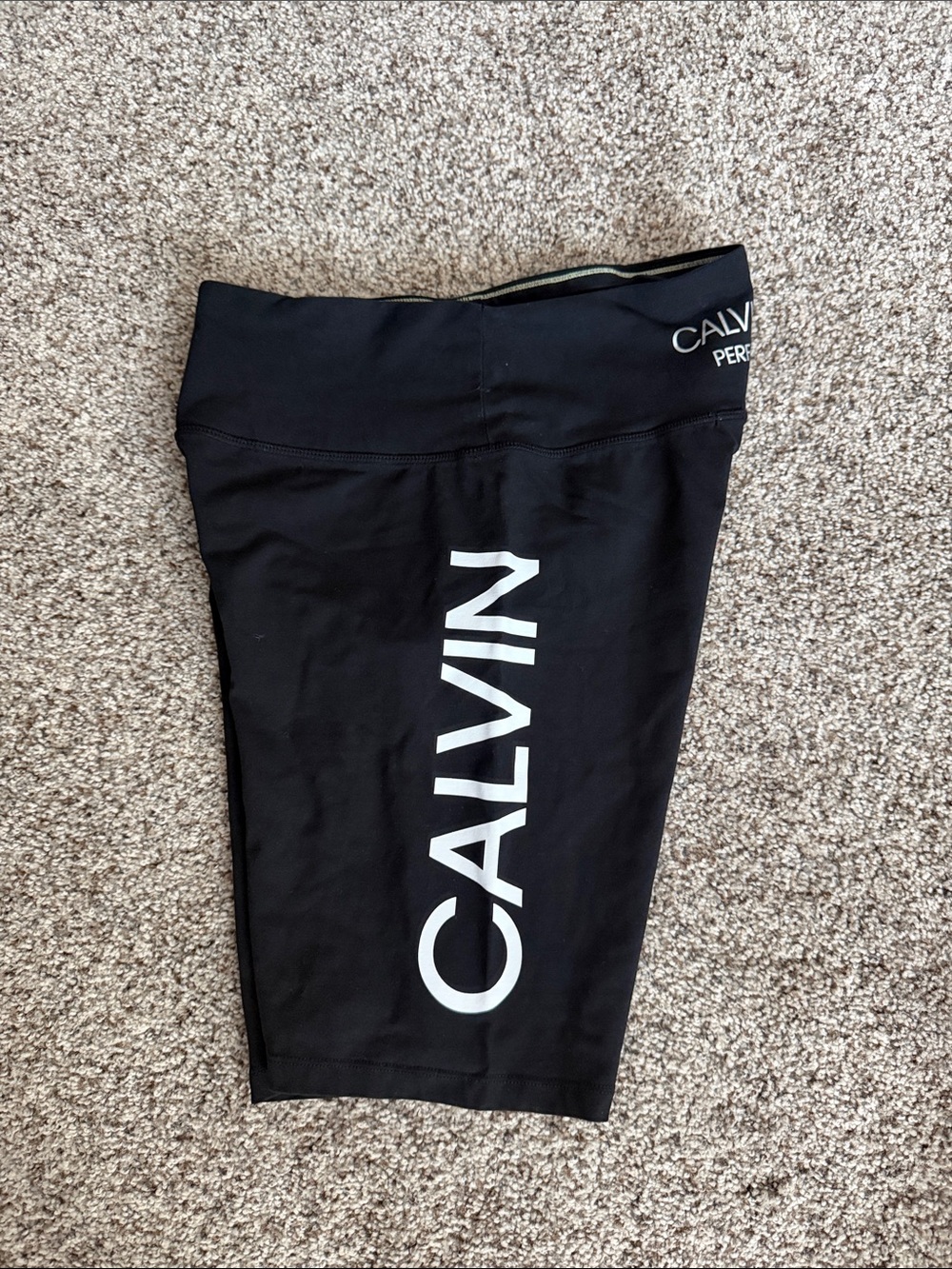 Calvin Klein Black Athletic Shorts with White Vertical Logo